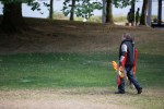 A lone warrior makes his way back to the starting position following a match.