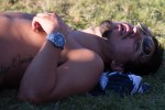 Perhaps having a toke too many, a man takes a solid nap on the grass.
