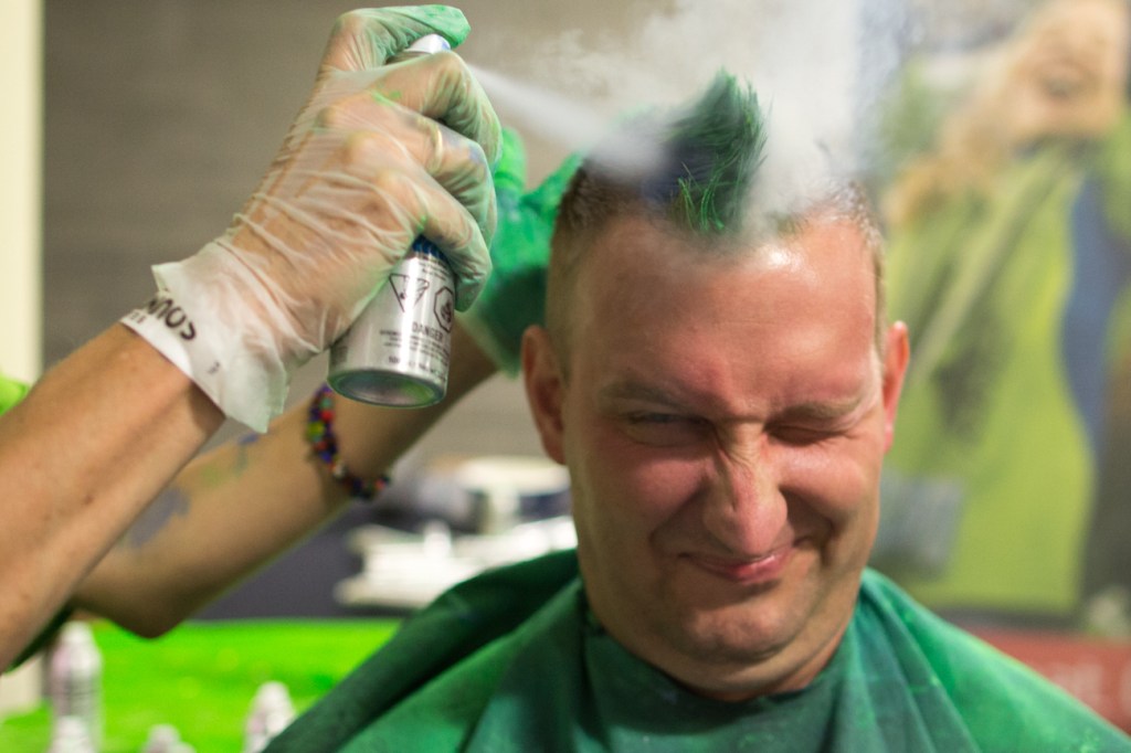 Didn't come to the game with your hair in team colors? Fear not, there were folks who could take care of that for you.