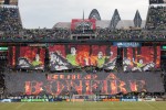 The Emerald City Supporter superfans unravel a huge tifo prior to the Cascadia Cup match in Seattle, WA on August 25, 2013. An announced crowd of 67,385 - one of the largest ever in MLS history - turned out for the epic rivarly match.