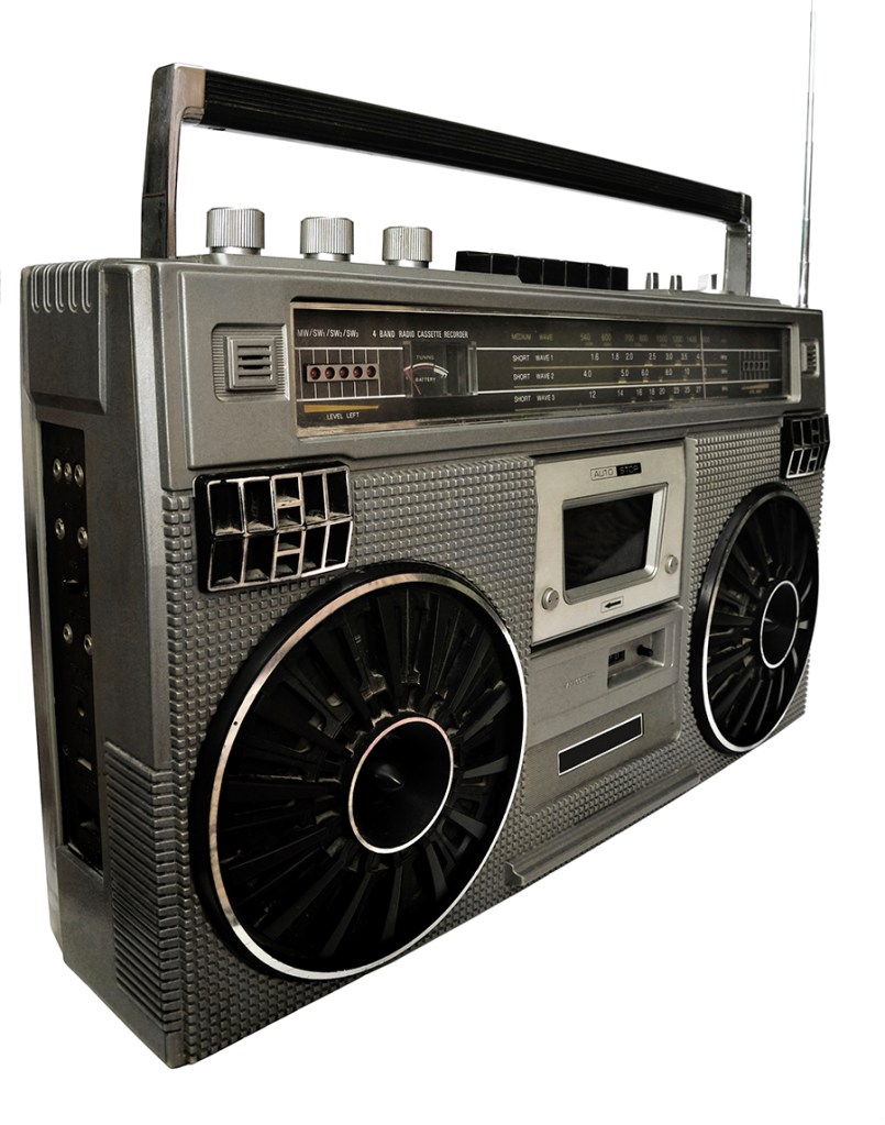 1980s Silver retro, boom box and headphone isolated on white.