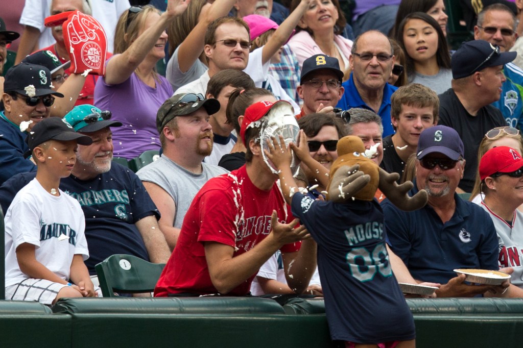 Pies being tossed into the face of opposing team fans...