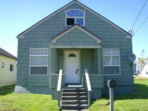 The owner of a neighboring house to Cobain’s former East 1st Street home is hoping for a residual payoff in the sale of his own home.