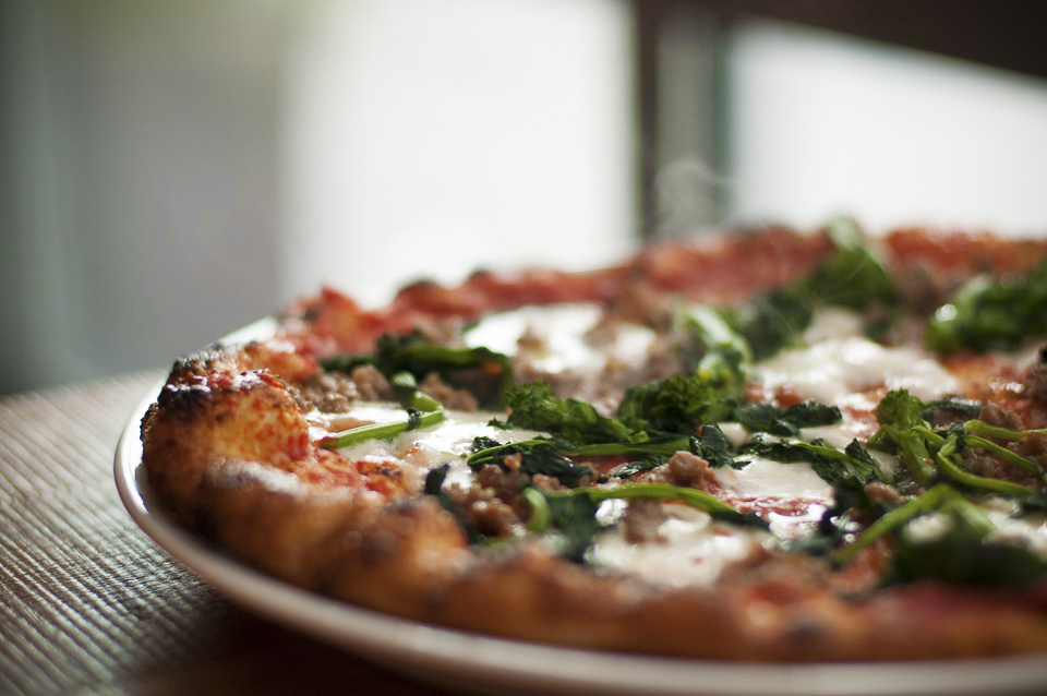 Left: wood-fired pizzas at Bar Cotto. Right: Rachael Coyle’s passion-fruit tart.
