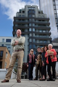 John Gleason, forefront, and other 98 Union residents fear an aerial peepshow if sky-borne pods were to travel beside their building.