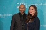 Director John Ridley and actress Hayley Atwell smile for the cameras before the opening night screening of 'Jimi: All Is By My Side.'