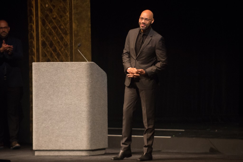 Director John Ridley gives one last small speech before the lights were lowered and film 'Jimi: All Is By My Side' officially opened SIFF.