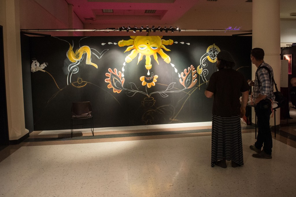 As I departed the festival, Henry's live painting piece was getting quite elaborate.