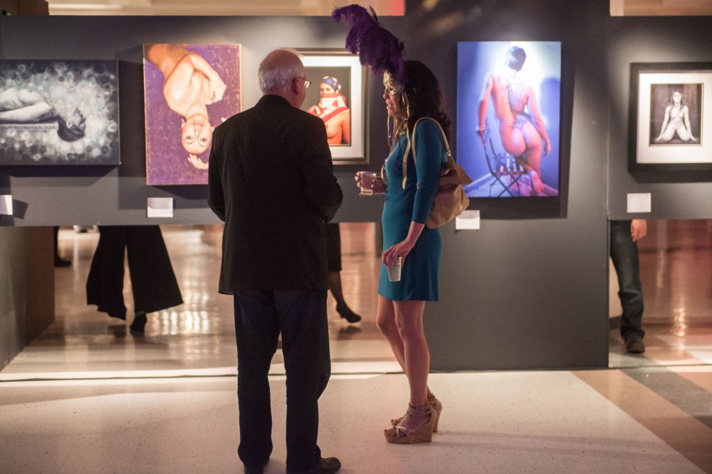 Artists and attendees mingled quietly for the first hour of the event taking a look at all the pieces availble for viewing.