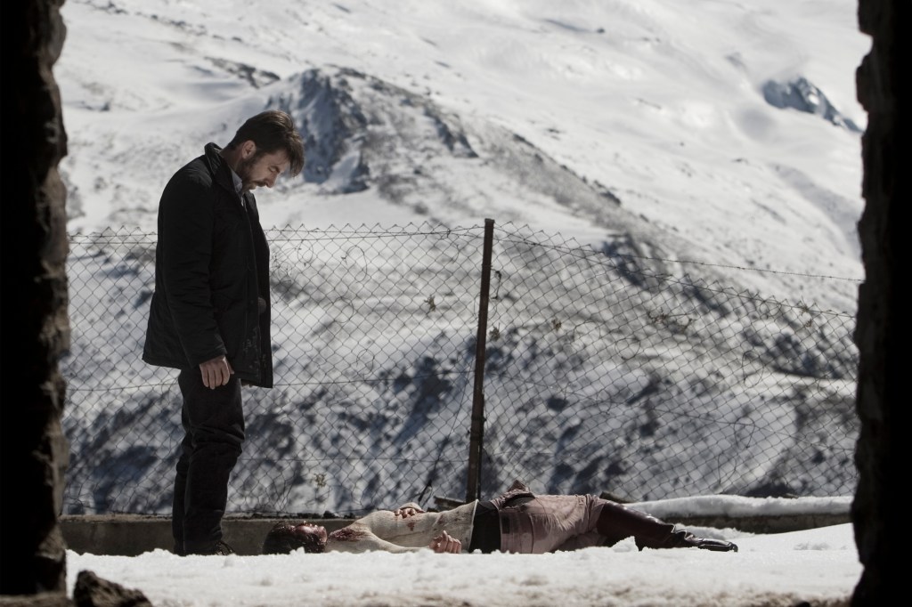 Carlos (de la Torre) inspects his work.Photo from Film Movement