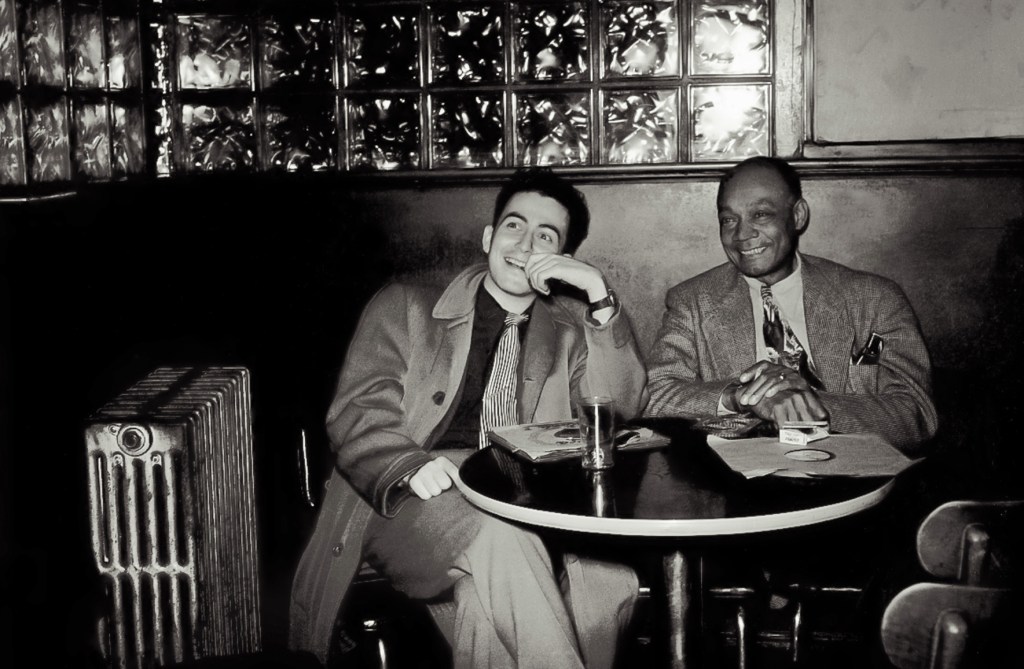 Hentoff (left) with clarinet player Edmond Hall in 1948.