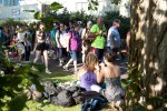 Festival attendees relax under a more shaded spot in Myrtle Edwards Park. Photo by Anna Erickson
