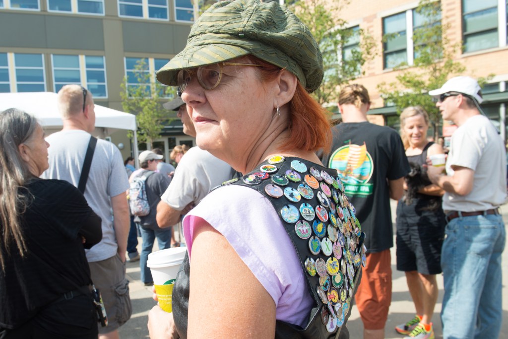 One cacher was sporting all the path tags she'd collected from others. "I'm running out of room, I'll have to get some boots to adorn next." Photo by Morgen Schuler