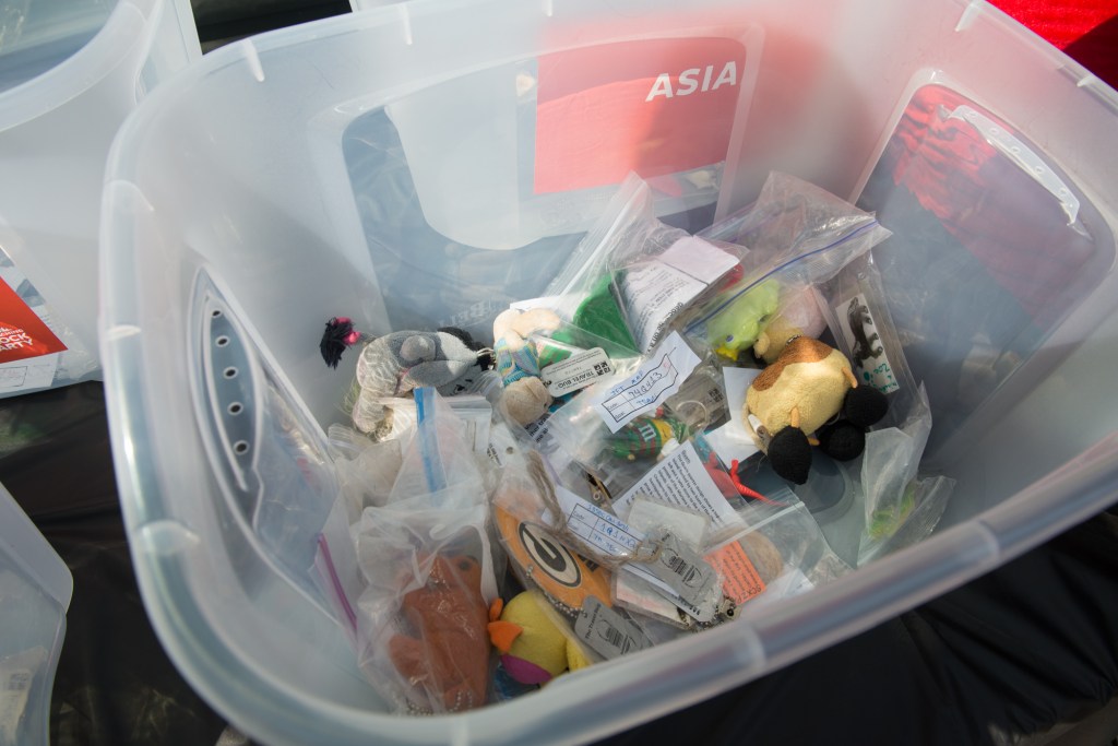 Boxes were set to the side for anyone to offer a cache to be hidden somewhere else in the world. So if you come from Asia, grab one from that box and take it home to hide. Photo by Morgen Schuler