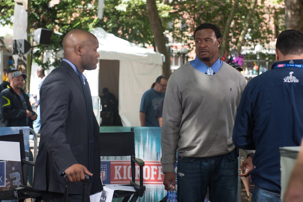 Willie McGinest getting ready for a little time on tv and chatting it up with Michael Robinson. Photo by Morgen Schuler
