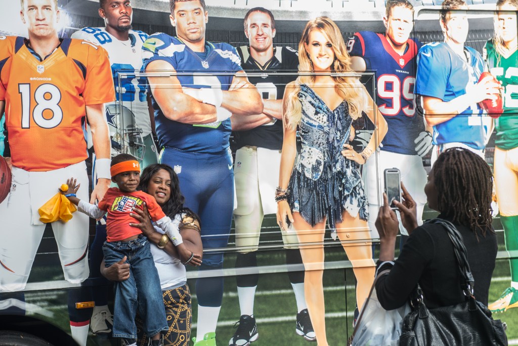 All the kiddos had fun getting shots in front of all the NFL gear. Photo by Morgen Schuler