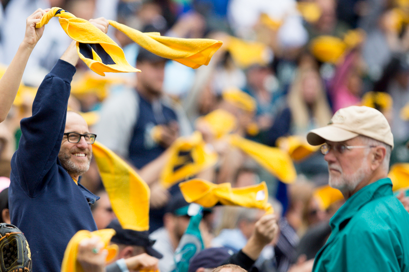 Fans cheer as the game gets underway.