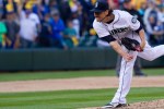 Seattle relief pitcher Danny Farquhar throws out the last pitch of the year, ending the game 4-1.