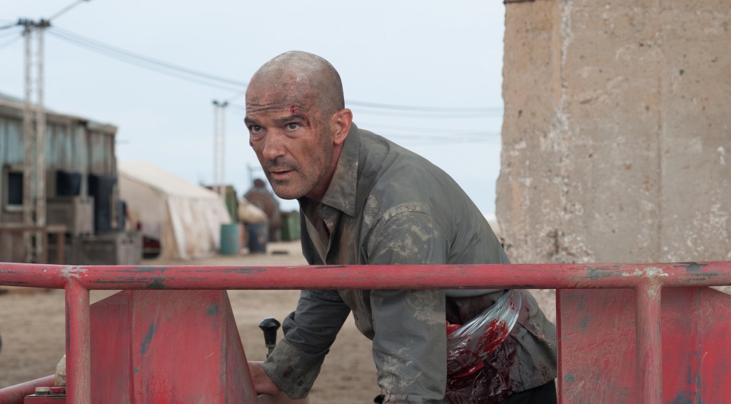 Banderas as battered insurance agent. Yana Blajeva/Millennium Ent.