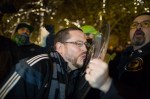 A fan kisses the Supporters Shield, won each season by the team with the best regular season record. Seattle won it for the first time in 2014.