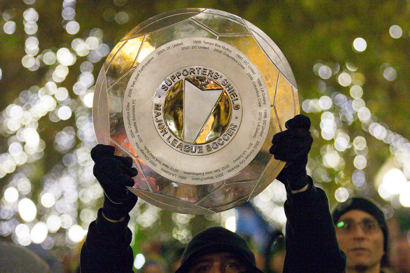 The Supporters' Shield is held up by members of the ECS fan club during the March to the Match pre-game celebration.