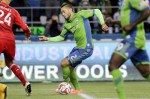 Clint Dempsey, Sounders star forward, works up the field toward the goal in the first half.