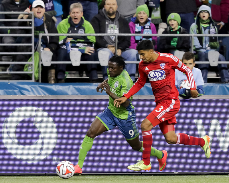 Martins tries to break away from a Dallas defender in the first half.