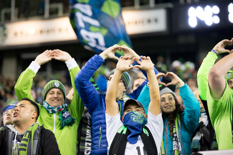 Fans cheer the Sounders in the first half.