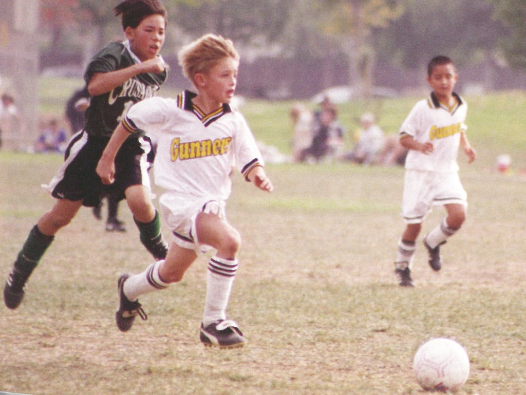 Awww! Rogers (foreground) as an irresistibly cute little baller in the mid-’90s.