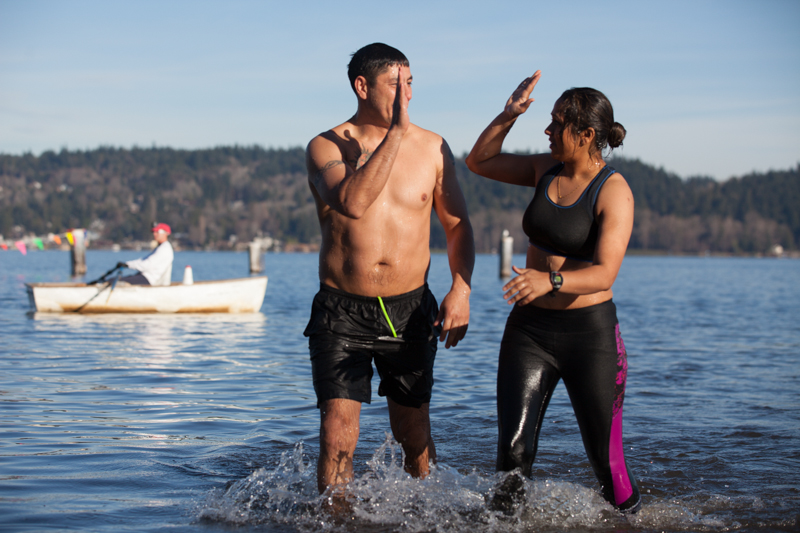 A couple exchange high-fives after taking the plunge.