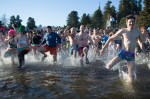 Participans race into the water to take their dunk.
