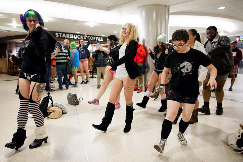An impromptu line dance party breaks out at SeaTac airport.