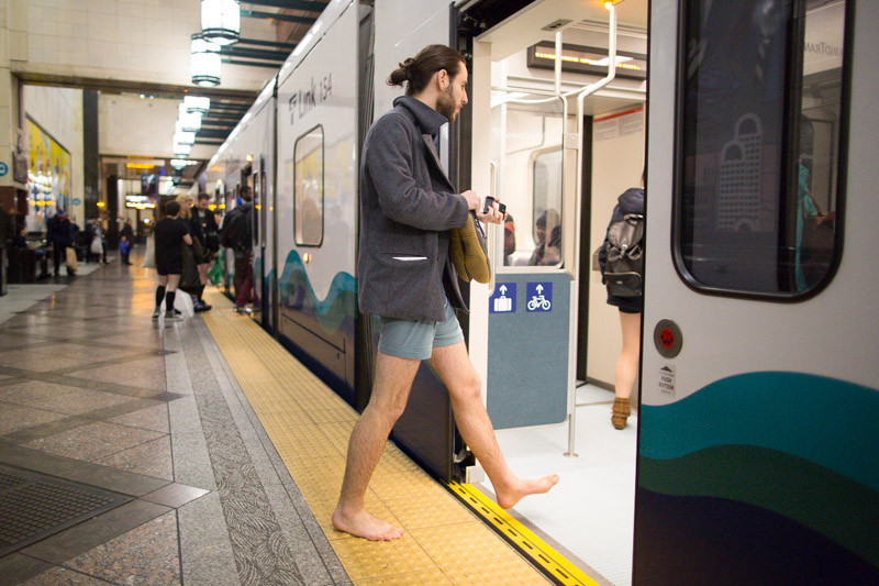 People ready for Seattle's 2015 No-Pants Light Rail ride in Westlake Station.