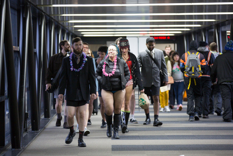 Set on SeaTac airport, a large group of people sans pants converge on SeaTac airport.