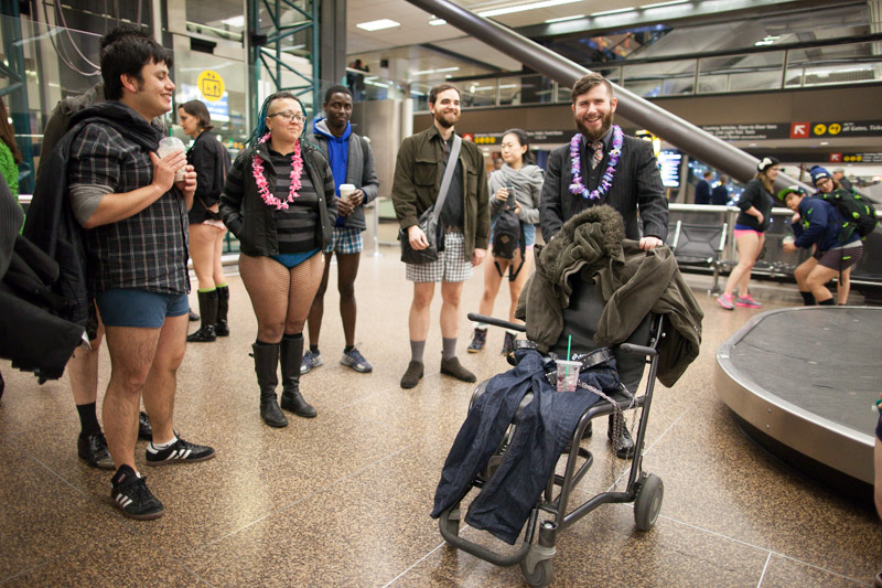 Riders fill a service chair with empty pants and a coat.