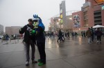 Fans pose with one another before the game.
