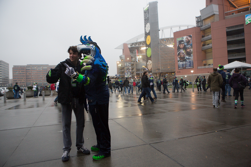 Fans pose with one another before the game.