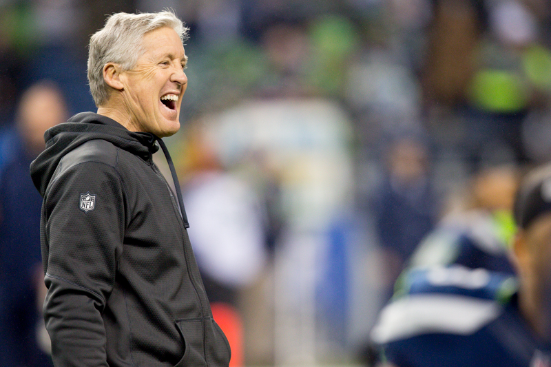 Seahawks head coach Pete Carroll laughs during pre-game practice.
