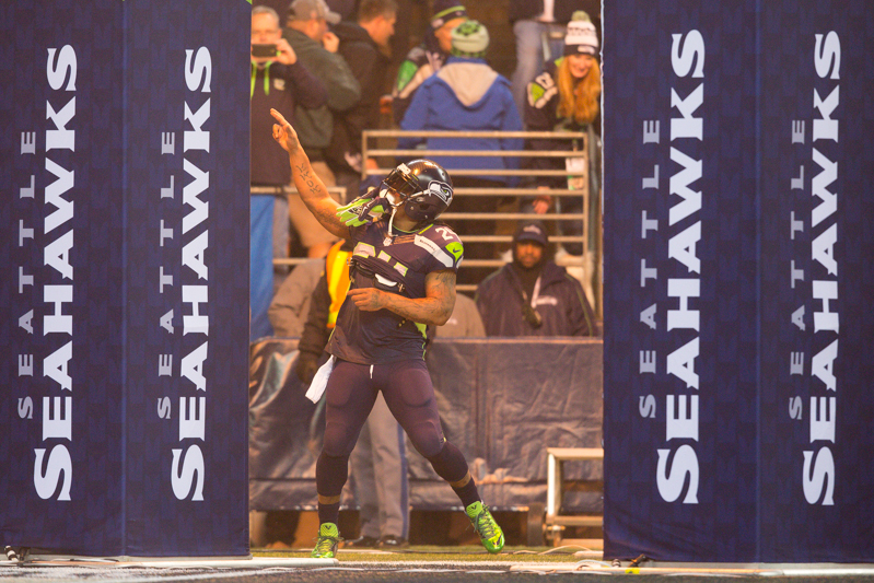 Seahawks' running back Marshawn Lynch pumps the crowd up as he enters the field before the game.