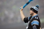A Panther fan cheers on his team as the game begins.