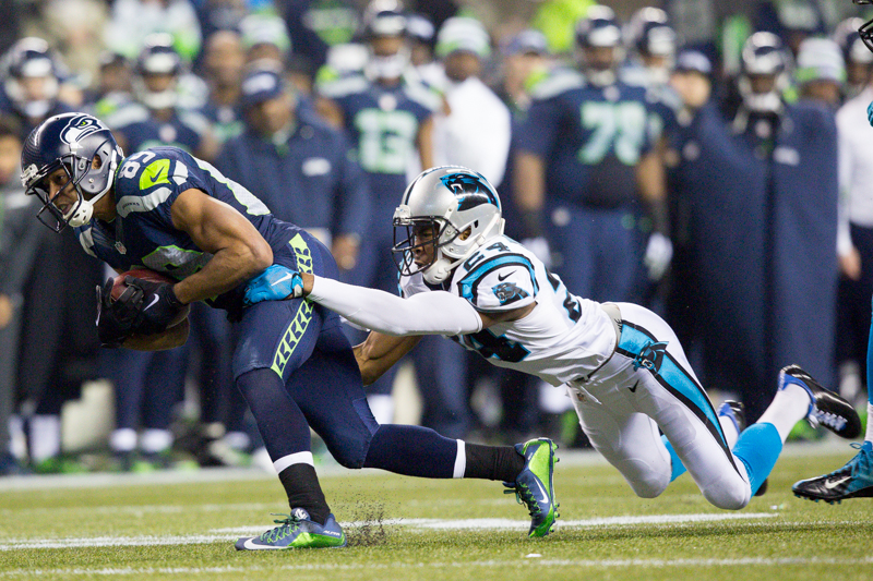 Seahawks' receiver Doug Baldwin struggles to gain extra yards on an 11-yard pass play in the first quarter.