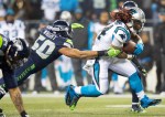 Panthers running back DeAngelo Williams picks up 8 yards in the second quarter.