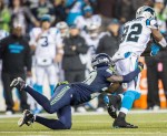 Panthers' wide-receiver Jerricho Cotchery catches a pass for an 11-yard gain in the second quarter.