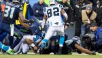 Players scramble for possession after Carolina fumbled the ball in the second quarter. The ball was ruled dead.