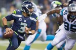 Seahawks quarterback Russell Wilson scrambles for a 14-yard gain in the third quarter.