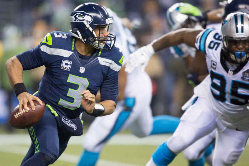 Seahawks quarterback Russell Wilson scrambles for a 14-yard gain in the third quarter.