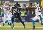 Marshawn Lynch breaks free of several Panther defenders for a 25-yard gain in the third quarter.