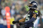 Seattle cornerback Richard Sherman pumps up the crowd during the fourth quarter.