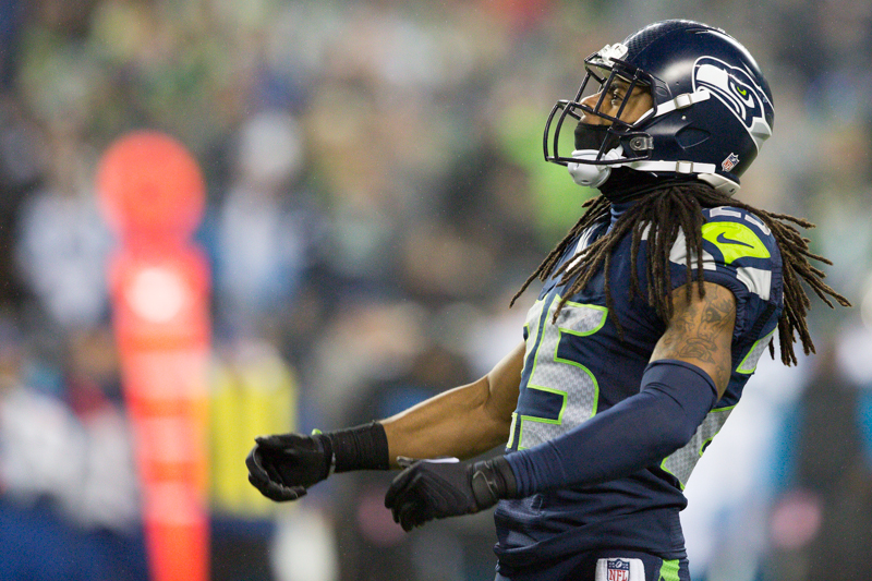 Seattle cornerback Richard Sherman pumps up the crowd during the fourth quarter.