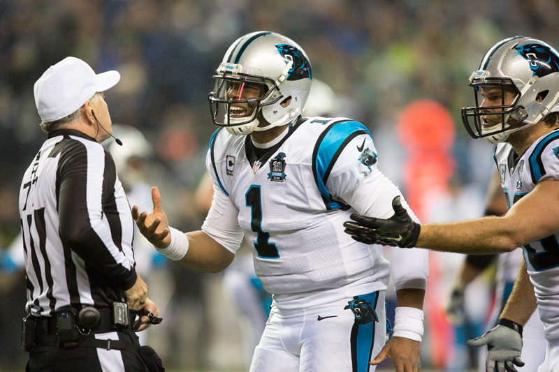 Panther's quarterback Cam Newton argues a call with a referee in the fourth quarter.
